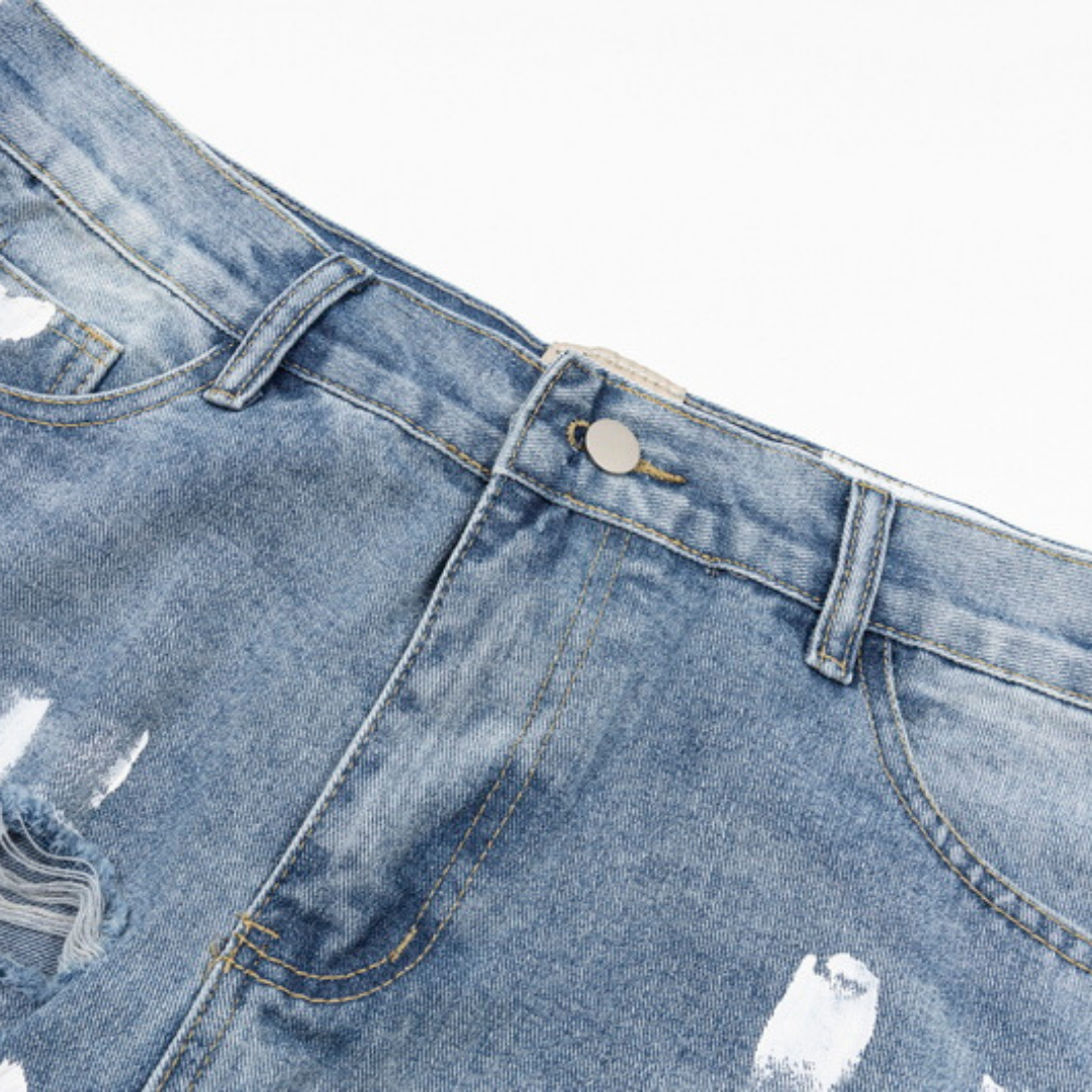 Flared Ripped Paint Blue Jeans
