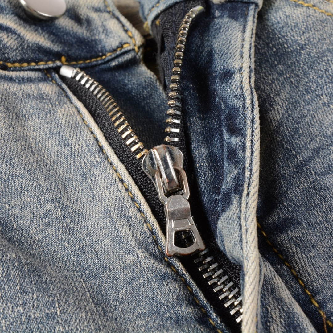 Black Bones Ripped Blue Jeans