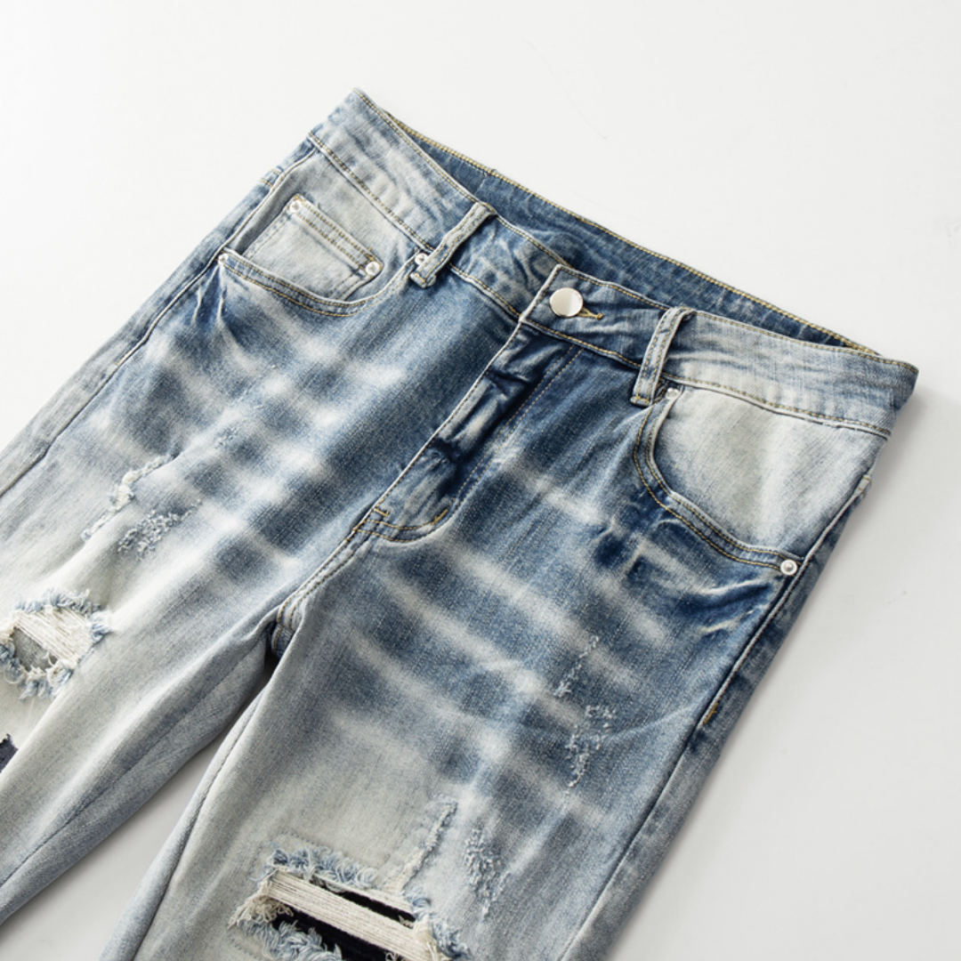 Logo Ripped Patch Jeans