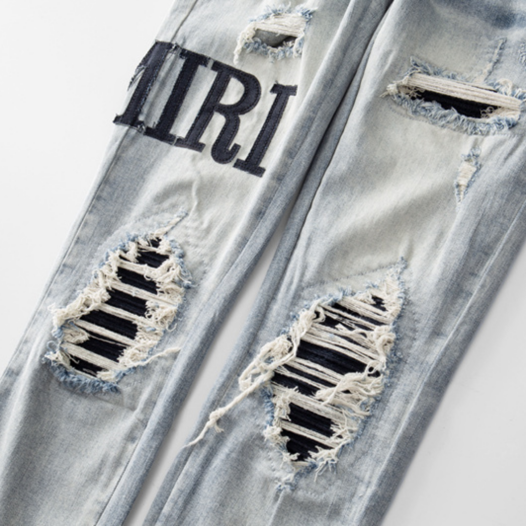 Logo Ripped Patch Jeans