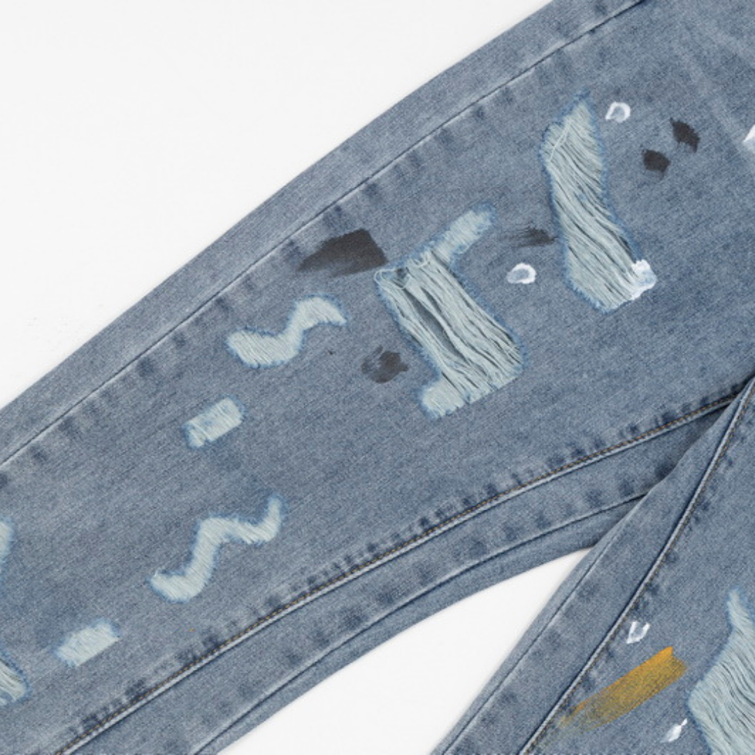 Flared Ripped Paint Blue Jeans