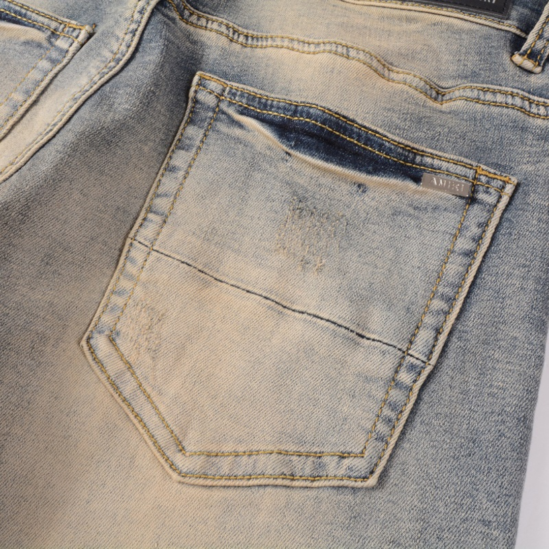 Black Bones Ripped Blue Jeans